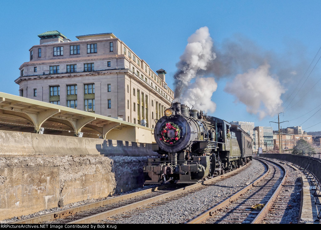 BLW 26 pulling the Santa Train past the former Delaware Lackawanna and Western passenger station in Scranton / now a Radisson Hotel